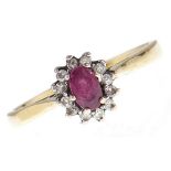 A ruby and diamond cluster ring, in 18ct gold, 2.6g, size M Good condition