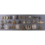 Miscellaneous British army cap badges and other insignia, including RAF, triangular War Service
