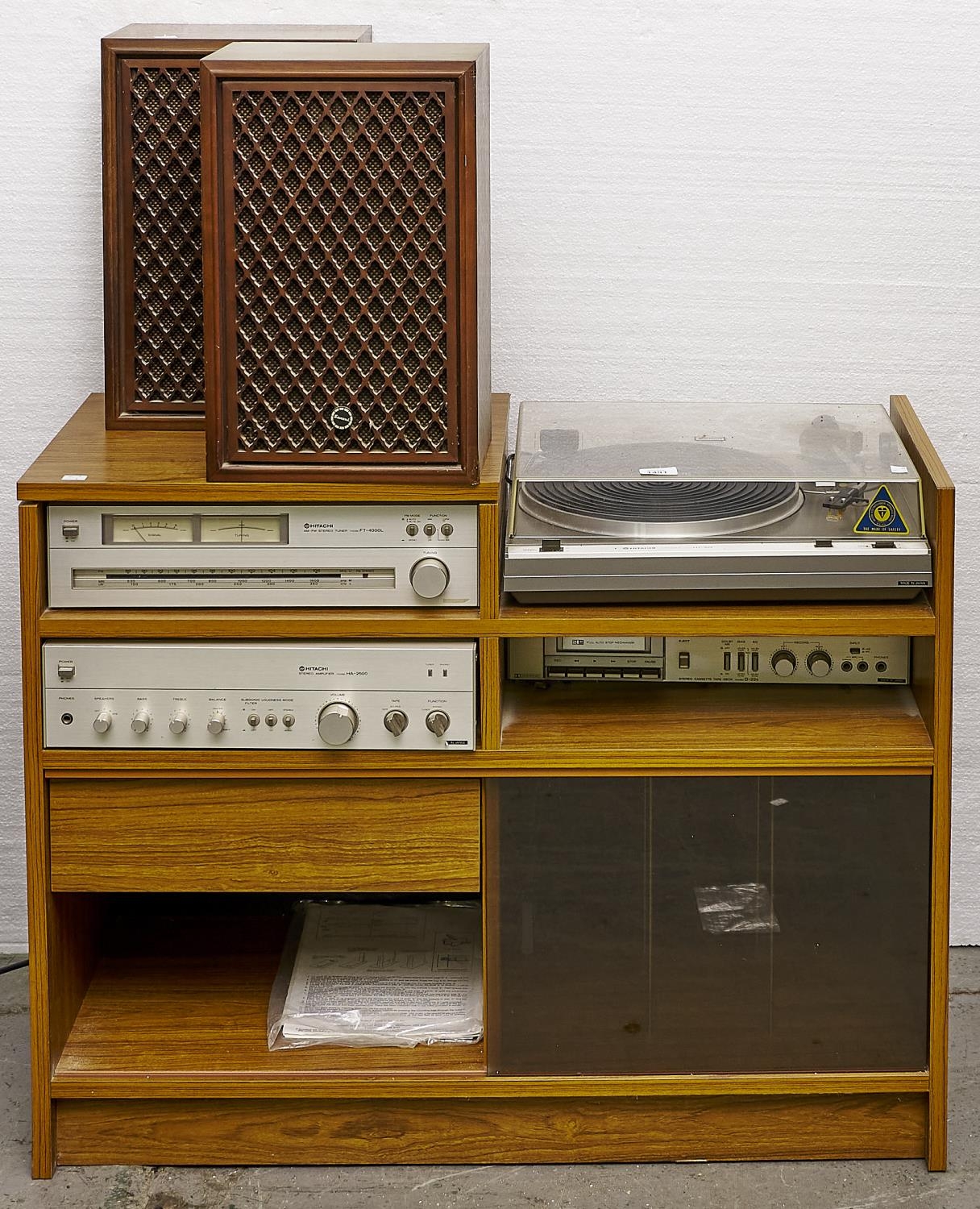 An Hitachi music system, comprising AM-FM stereo tuner, model FT-4000L, stereo amplifier model HA-