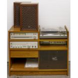 An Hitachi music system, comprising AM-FM stereo tuner, model FT-4000L, stereo amplifier model HA-