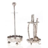 A set of three Dutch miniature silver fire tools and stand and another stand, c1900, 85mm h and