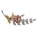 A ruby and diamond spray brooch, in two colour 9ct gold, 3.8g Good condition