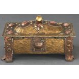 An Arts and Crafts brass and copper casket, early 20th c  15cm l Old solder repair to hinges,