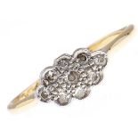 A diamond cluster ring, in gold marked 18ct PLAT, worn, 2g, size Q Wear consistent with age