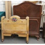 Two floral painted pine single bedsteads and a walnut bedstead Pine examples - paint rubbed and