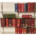 Genealogy. Three shelves of books, to include Burke's and Debrett's Peerage, various editions,