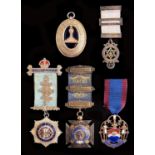 Freemasonry. A silver gilt masonic District Grand Officer's collar jewel, with blue glass centre,