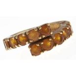 A Portuguese citrine ring, in gold, control mark for 18ct, 8.4g, size N Wear scratches