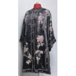 A Chinese black silk robe, early-mid 20th c, worked with chrysanthemums and floral pendants in