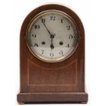 An inlaid mahogany domed top mantel clock, c1920, the case outlined with boxwood stringing, the