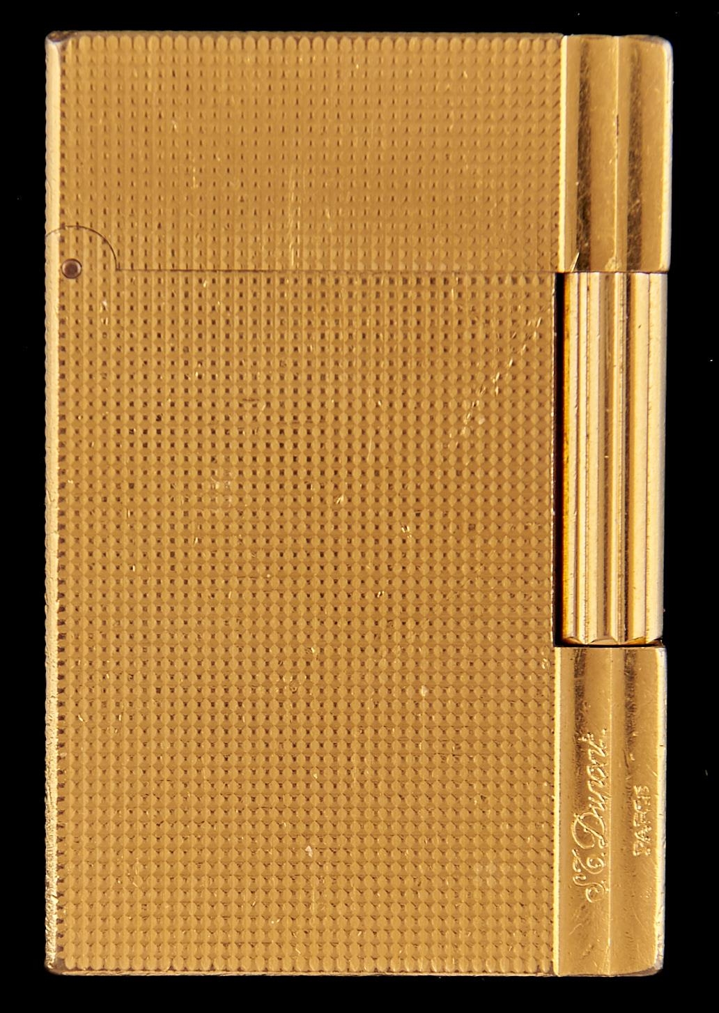 An S T Dupont gold plated cigarette lighter, No 11GTR05, cased Slight signs of use consistent with