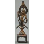 A gilt bronze sculpture of Guanyin, Tang dynasty or later, open mandorla and waisted plinth raised