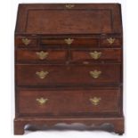 A George III oak and crossbanded bureau, late 18th c, 92cm l Some damage, brass handles old