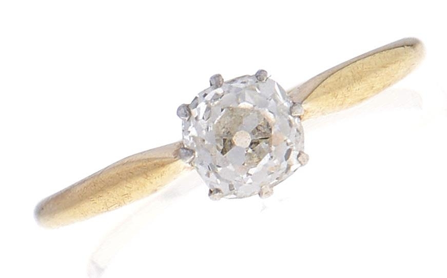 A diamond solitaire ring, the cushion shaped old cut diamond weighing approximately 0.5ct, gold