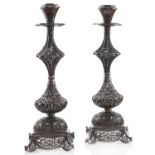 A pair of silver filigree candlesticks, 20th c, 20cm h, marked 925, 12ozs 5dwts One of the drip pans