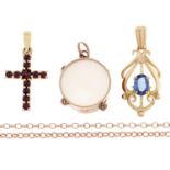 A gold and mother of pearl tambourine charm, early 20th c, 14mm, marked 9c, a garnet set gold cross,
