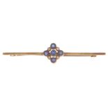 A sapphire and split pearl bar brooch,  in gold, 60mm, marks rubbed, 4g Wear consistent with age