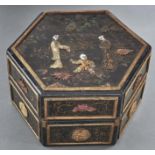 A japanned hexagonal jewel box, with Chinese carved soapstone and other appliques, late 19th / early