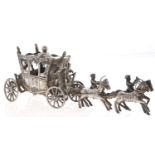 A German silver model of a coach and four, 21cm l, Hanau pseudo hallmarks, import marked, B.