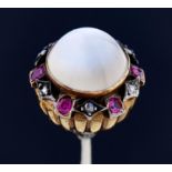 A Belle Epoque hat pin with jewelled terminal, c1900, the high domed moonstone cabochon in a