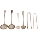Two pairs of George III silver sugar bows and two sauce ladles, a Victorian silver cream ladle and a