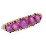 A five stone ruby ring, early 20th c, in gold marked 18, 4g, size N Stones slightly scratched on