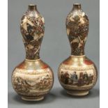 A pair of Japanese satsuma double gourd shaped vases, by Kozan, Meiji period, the lower part painted