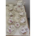 A Royal Crown Derby Derby Posies pattern tea service, printed mark Chip on rim on the smaller of the