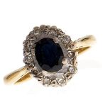 A sapphire and diamond cluster ring, in 18ct gold, 2.9g, size G½ Good condition