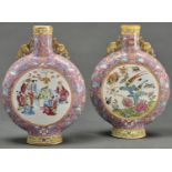 A pair of Canton pink ground famille rose moon flasks, late 19th c, painted with a group of