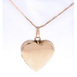 A 9ct gold heart shaped locket, 20mm, Chester 1958 and a 9ct gold necklet, 4.4g Light wear and