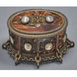 An oval Palais Royal cameo mounted tortoiseshell brass chain bordered jewel casket, late 19th c,