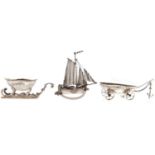 A Dutch miniature silver model of a boat on wheeled carriage, 10cm l, import marked Singleton, Benda