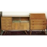 A mid century walnut  bureau, 1950s, the fall flap revealing interior of two short drawers and
