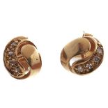 A pair of diamond ear studs, in gold marked 750, 2.8g Good condition