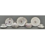 A group of Spode Swag and Dolphin Embossed bone china tea and dessert ware, c1812-15, painted with
