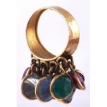 A chrysoprase paste and synthetic sapphire suspended gem set ring, gold band, unmarked, 11.6g,