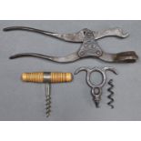 An English Lund's patent two piece lever corkscrew and a French roundlet or pocket corkscrew, with