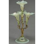A Victorian giltmetal and opalescent glass flower stand, c1900, the support of naturalistic entwined