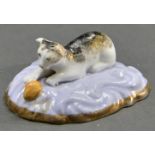 An English porcelain miniature model of a tabby cat, c1820, on gilt edged and scroll moulded low