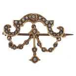 An articulated split pearl festoon brooch, in gold marked 14k, 3.1g Solder repair