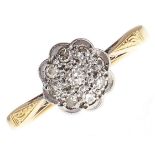 A diamond cluster ring, in gold marked 18ct PLAT, 2.7g, size L Good condition