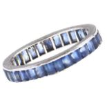 A sapphire eternity ring, platinum mount, unmarked, 3.3g, size L Light wear scratches