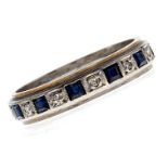 A sapphire and diamond eternity ring, two colour gold mount marked 18ct, 5g, size R Light
