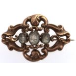 A Victorian aquamarine brooch, c1870, in gold, 8.1g Much dirt but undamaged, no repair. Note: in our