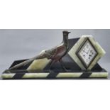 A French Art Deco onyx, nero belge and patinated spelter mantel clock, c1930, the rectangular base