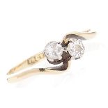 A diamond crossover ring, in gold marked 18ct, 1.6g, size I Wear consistent with age, engraved