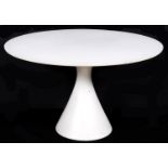 A circular white modern dining table in the manner of Saarinen, third quarter 20th c, the top
