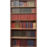 Six shelves of books, decorative bindings
