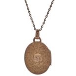 An Edwardian oval 9ct gold locket, foliate engraved, Birmingham 1907 and a gold necklet, 9.8g (2)